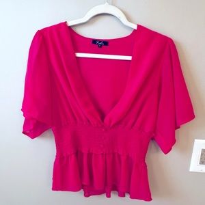 Women’s hot pink boutique top.